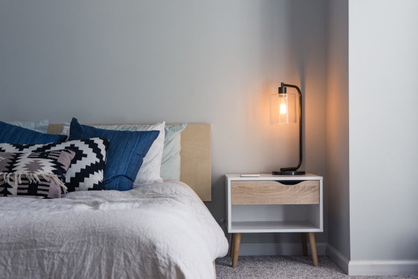 Modern bedroom with a bed and a bedside table