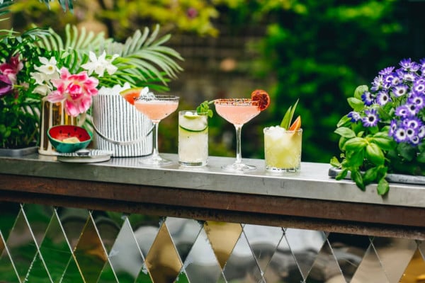 Outdoor cocktail bar with cocktails on the counter