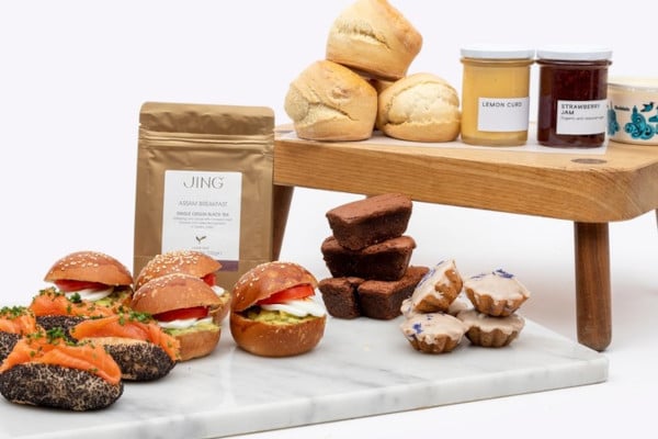 Scones, rolls and cakes on a marble surface