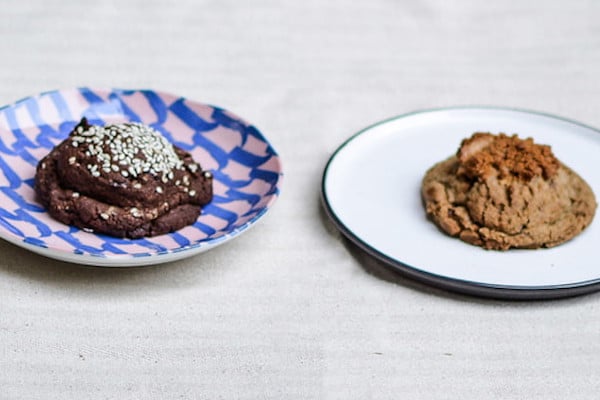 Two cookies on two plates next to each other