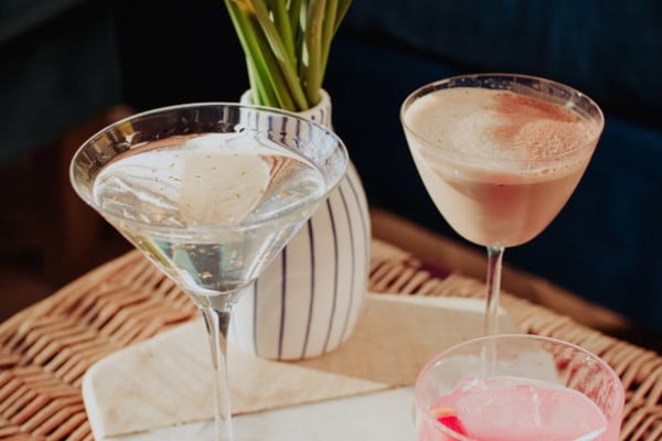 Three cocktails in cocktail glasses