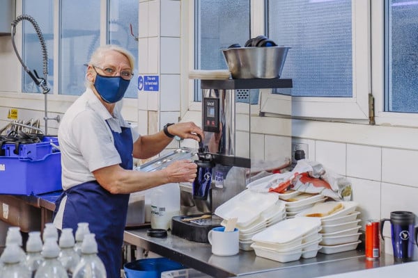 Sue making a hot drink in the Whitechapel Mission kitchen