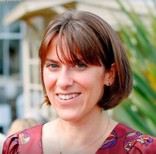 Photo of Sylvia smiling at the camera
